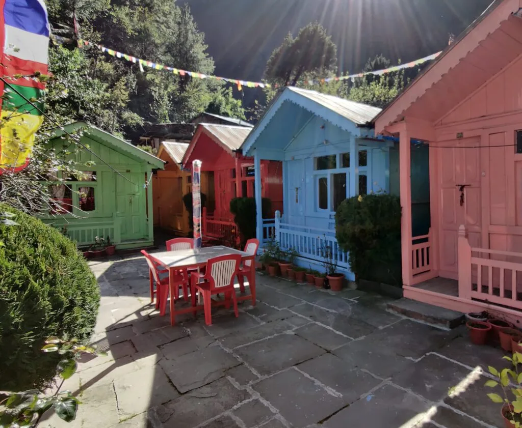 Colourfully painted wooden chalet in a teahouse in Chame on the Annapurna Circuit