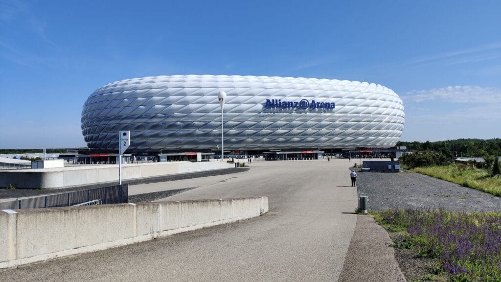 Allianz Arena outside with the iconic bubble exterior shape on a blue sunny day