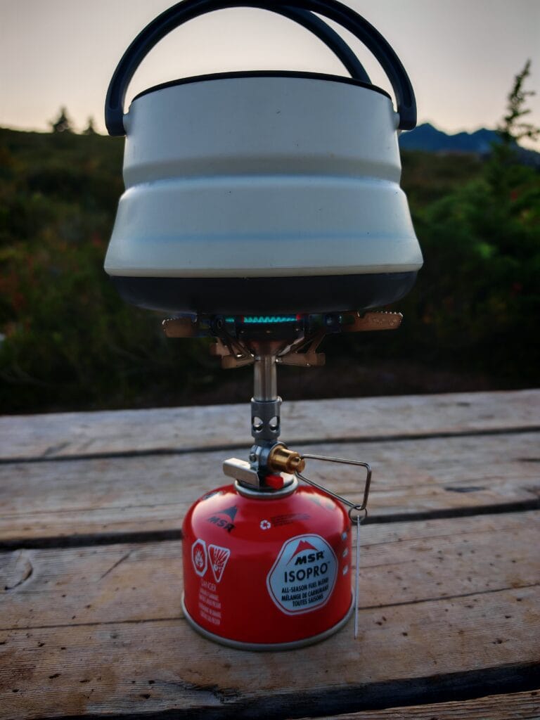 Soto Windmaster stove boiling water in a collapsible Sea to Summit Kettle at Elfin lakes
