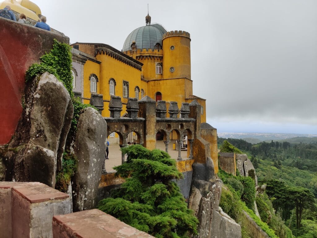 The National Palace of Pena on the hilltop overlooking Sintra on a Sintra Day trip from Lisbon