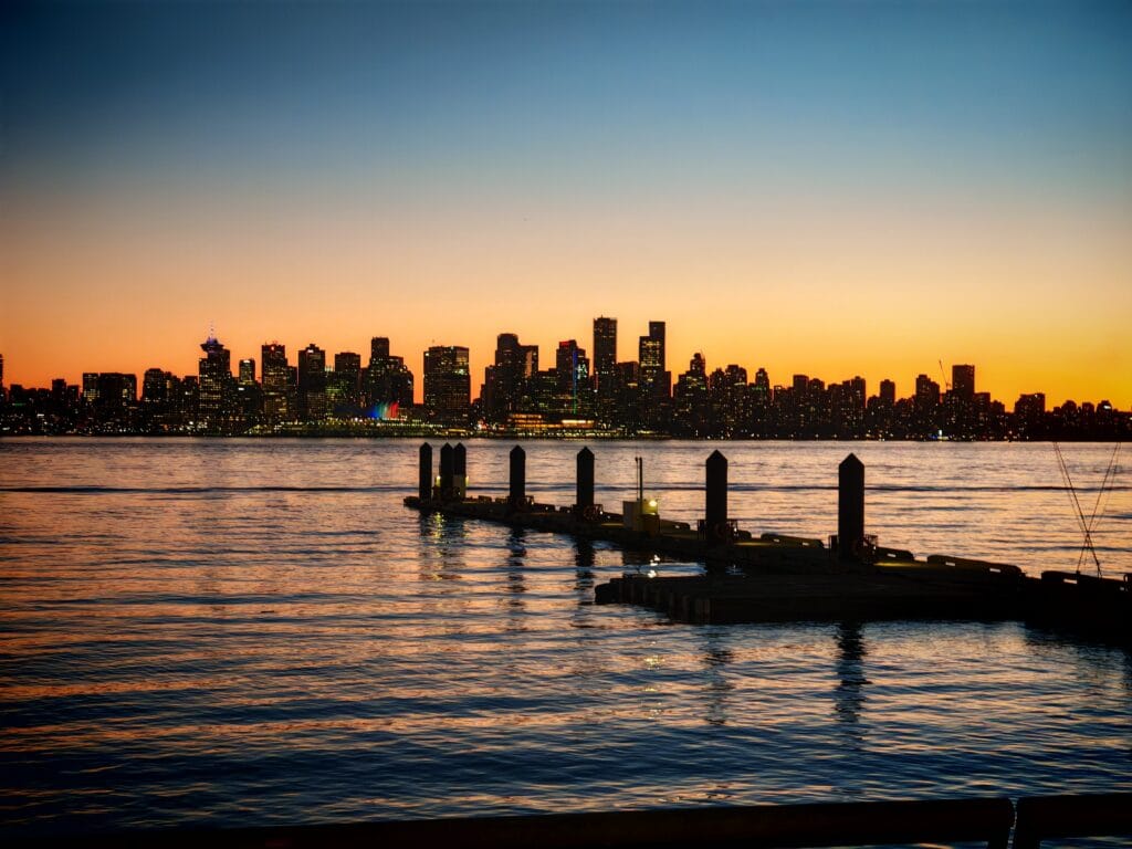 Vancouver downtown at sunset as seen from North Vancouver as part of the Vancouver City Guide