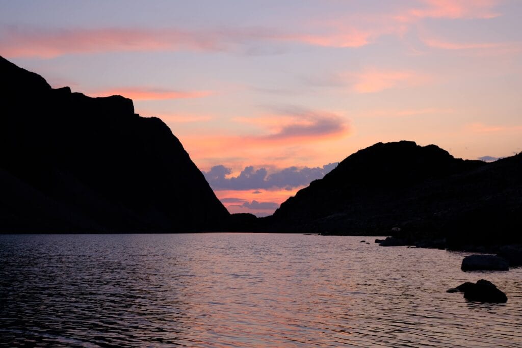 sunset over wedgemount lake with pink colours in the sky