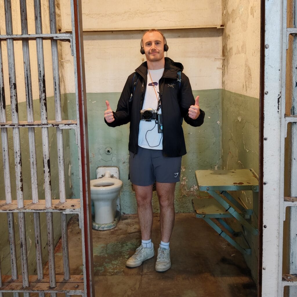 A guy wearing the Arc'teryx Atom in Alcatraz Prison in San Franisco