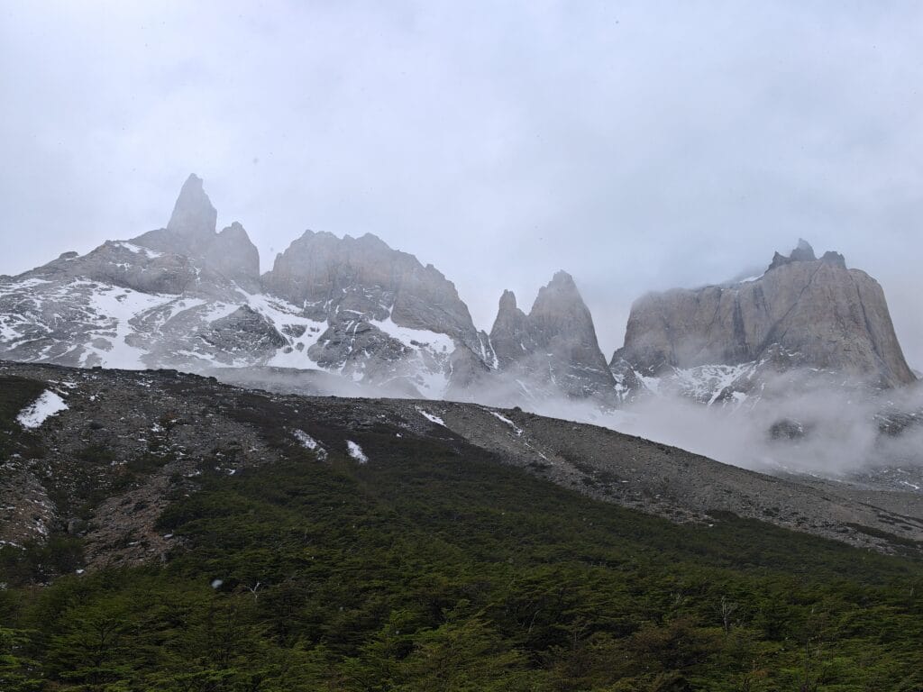 Jagged peaks of the Los Cuernos in the clouds from the French Valley on the W Trek