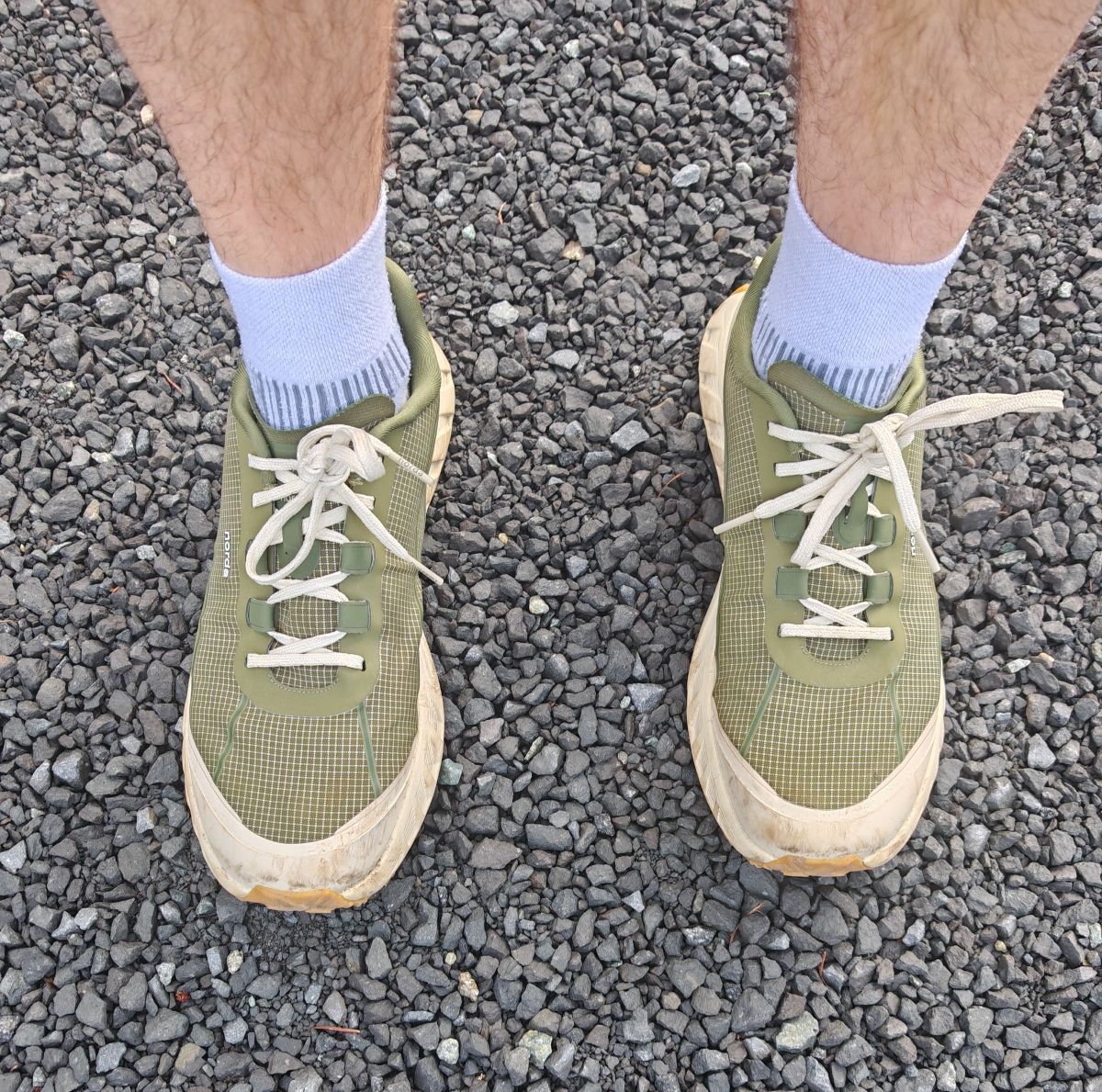 Norda 002 Trail Running Shoes on gravel trail