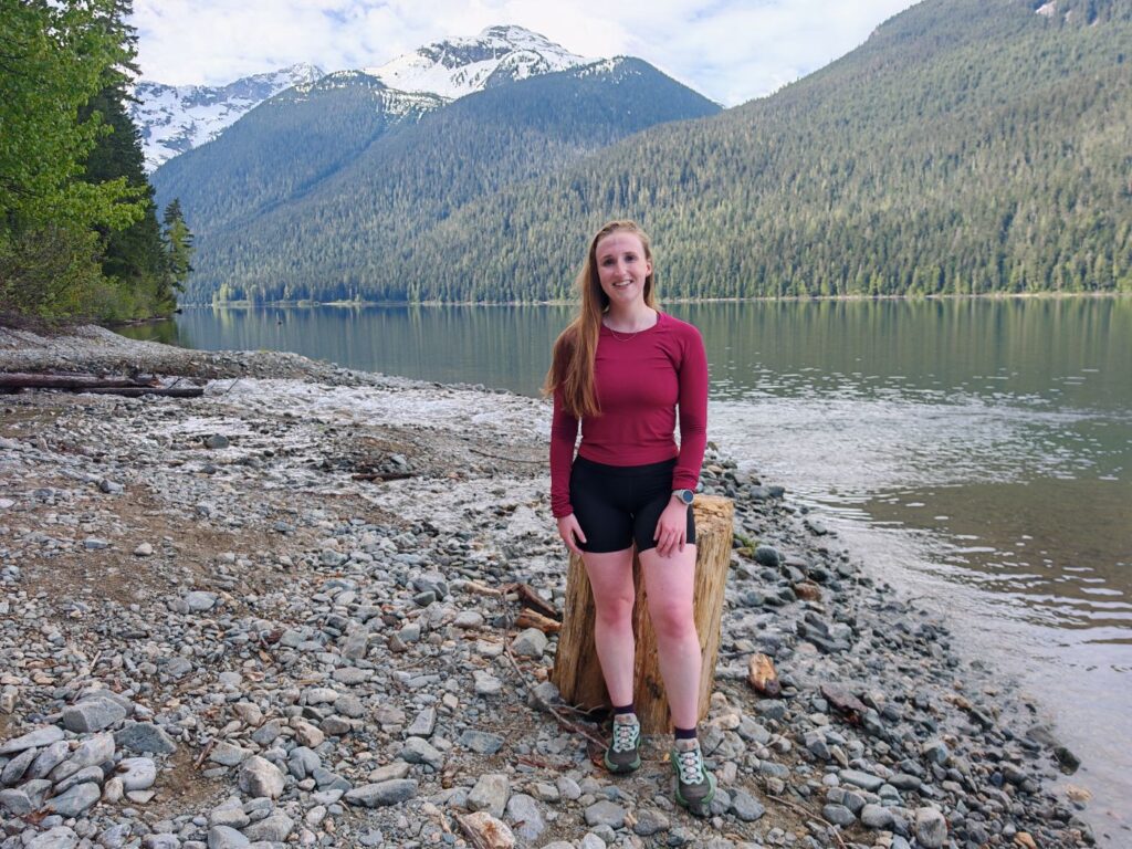 Female trail runner at Cheakamus Lake in Whistler using the Salomon Genesis