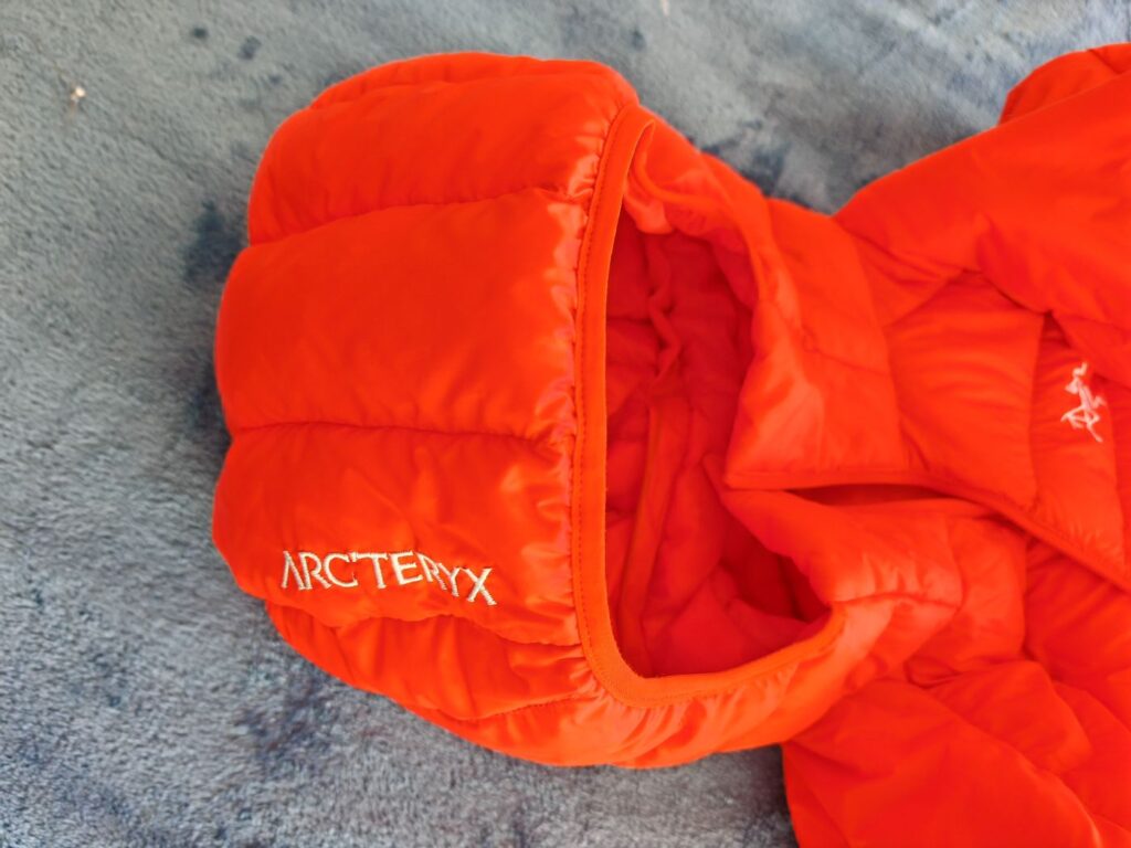 The helmet compatible Hood of the Arc'teryx Cerium with the iconic Arc'teryx Branding